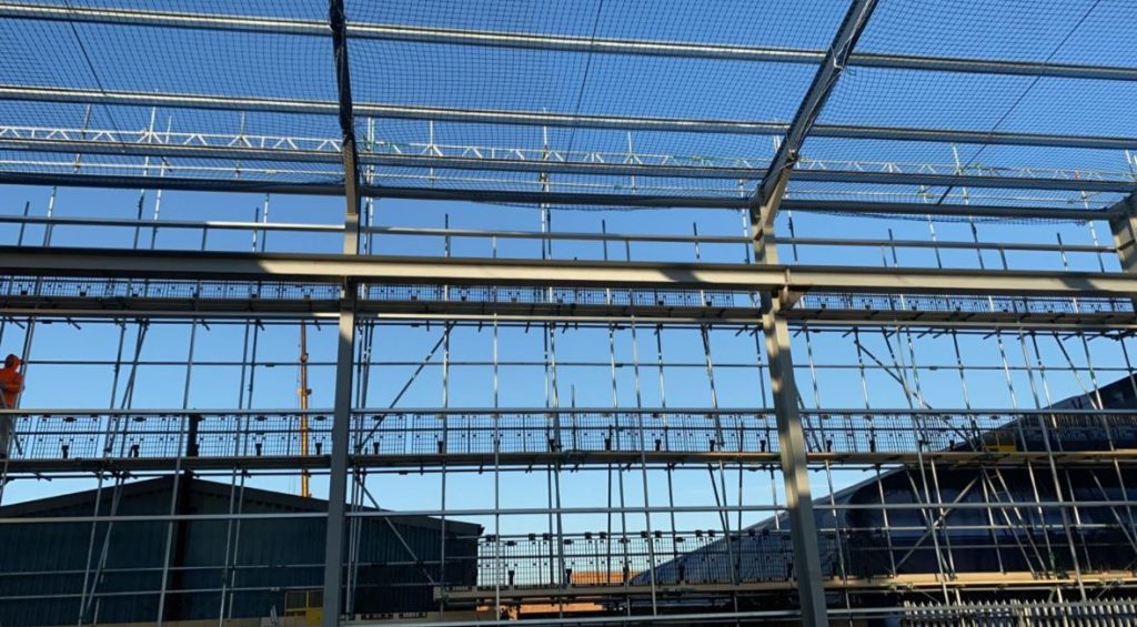 a picture of steel bars with scaffolding supporting